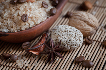 SPA concept: natural sea salt with coffee beans, cinnamon and an