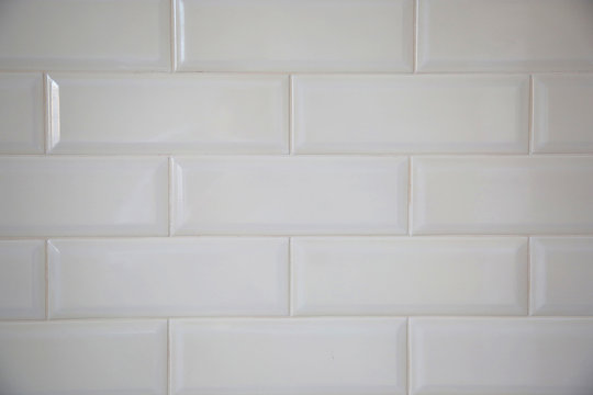 white tiled wall © sociopat_empat