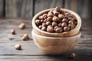 Raw hazelnut on the wooden table