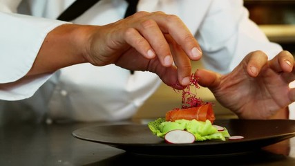 Chef preparing a plate