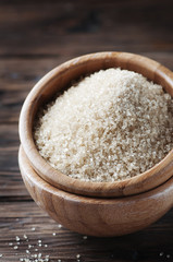 Sweet Brown sugar on the wooden table