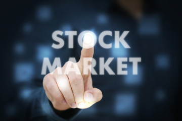 Businessman touching Stock Market