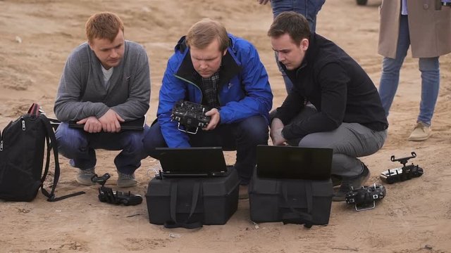 The team of programmers and technicians customizes equipment. They are engaged in the field of automatic flight obespechngiem several drones. 