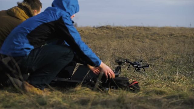 The team of programmers and technicians customizes equipment. They are engaged in the field of automatic flight obespechngiem several drones. 