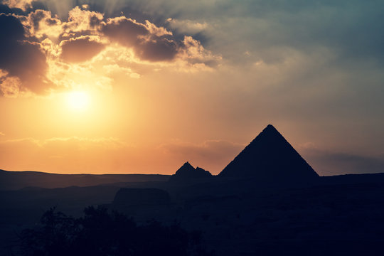 The Great Pyramid of Giza at sunset. Cross processed with filter.