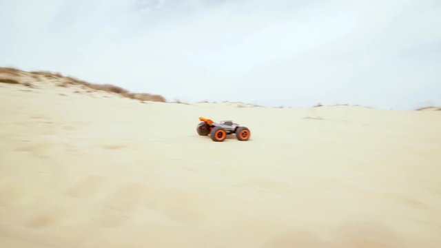 Family spending time together and having fun in Oleshky sands.Ukraine. Slow motion