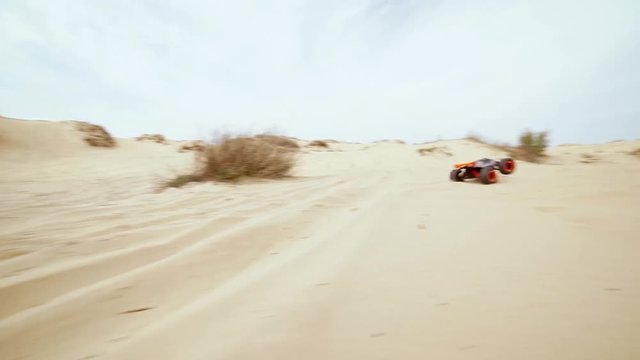 Family spending time together and having fun in Oleshky sands.Ukraine. Slow motion