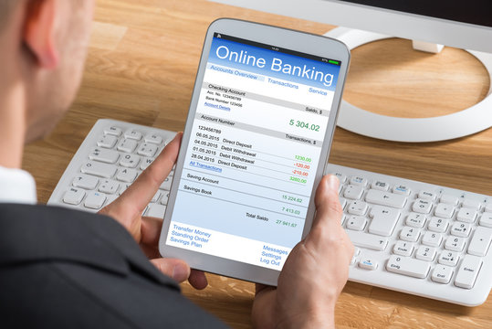 Businessperson Online Banking Using Digital Tablet