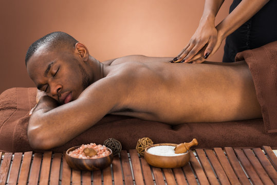 Man Getting Massage In Spa