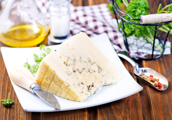 cheese on plate and on a table