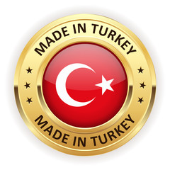 Made in turkey button with gold border on white background
