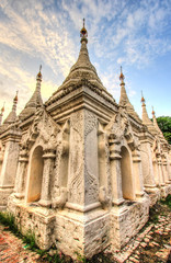 Naklejka premium Sandamuni pagoda,Mandalay,Myanmar- known for its large golden pagoda, its hundreds of shrines containing inscribed marble slabs and the largest iron Buddha image in Myanmar.