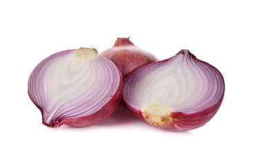 whole and half cut red onion, shallots on white background