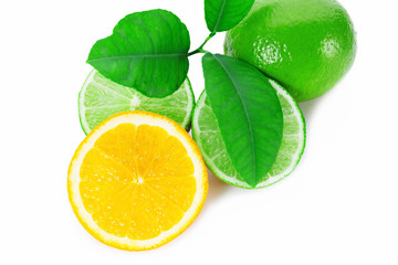 Slices of fresh orange with lime and leaf on white background