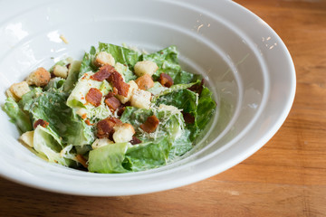Chef's salad in the white bowl