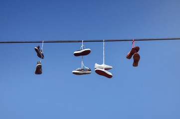 Hanging sneakers