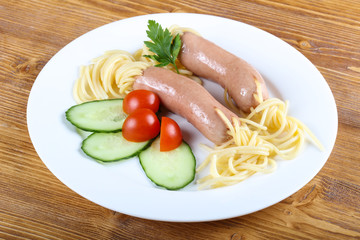 Kids spaghetti with sausages