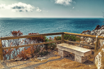 stone bench on steep cliffs