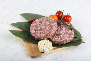 Raw burger cutlet