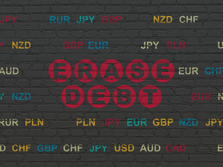 Finance concept: Erase Debt on wall background