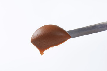 chocolate spread on knife