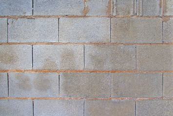 View of a grey brick wall. Background image