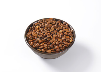 Bowl of roasted coffee beans
