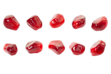 Pomegranate red seed collection isolated on white, clipping path