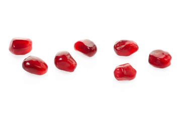 Fototapeta na wymiar Pomegranate red seeds collection on white, clipping path