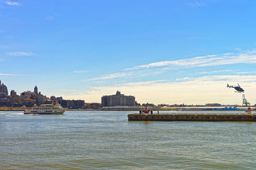 River view on Helicopters in Manhattan and Brooklyn on backgroun