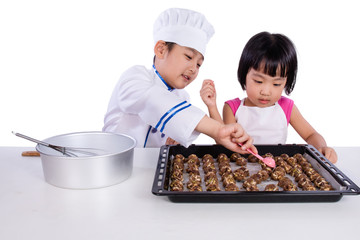 Asian Chinese Kid Baking Cookies