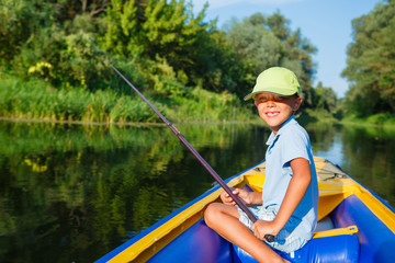 Boy fishing at the river