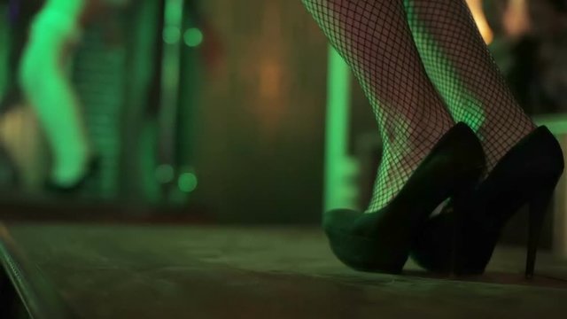 Black female high heels fishnet tight dancing