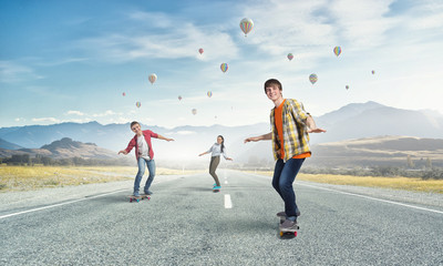 Fototapeta premium Young people riding skateboard