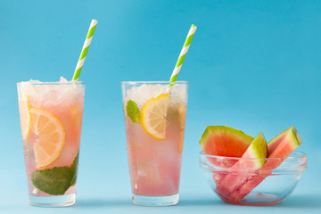 Fresh watermelon mojito. Blue background
