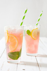 Fresh watermelon mojito on white wood
