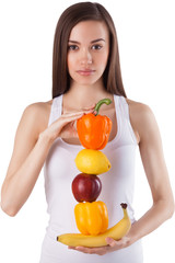 beautiful girl holding fresh vegetables and fruit