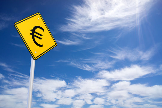 Yellow Road Sign with Euro Sign Inside on Blue Sky Background