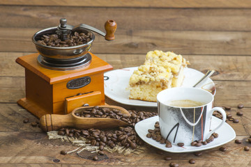 cup of coffee, apple cake and coffee grinder