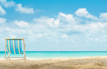 one canvas beach bed on the beach with nice sky and cloud