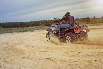 Racing ATV is sand.  © Bondariev Volodymyr.