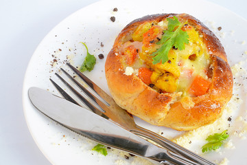 Bread baked potato with cheese and spices