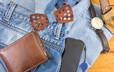 Modern man accessories with denim clothes