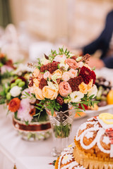 bride and groom with wedding bouquete. Closeup boquet