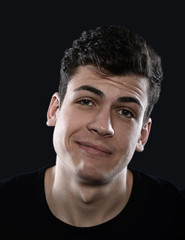 Obraz premium sarcastic young man studio portrait 