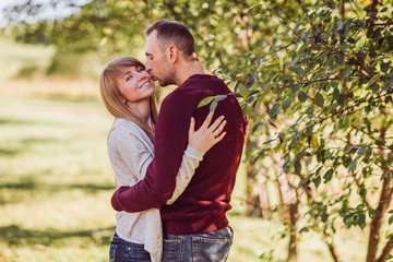 Fototapeta premium young couple in love having fun and enjoying the beautiful nature