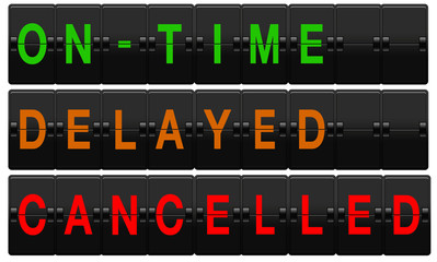 Airport split-flap board with on time, delayed and cancelled text