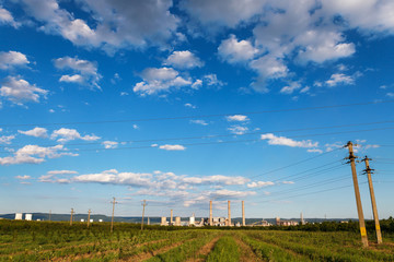 Blue cloudy sky over factory - industrial zone, Romania