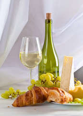  cheese with grapes and croissants