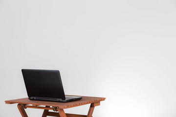 A Laptop, ready to use on a table